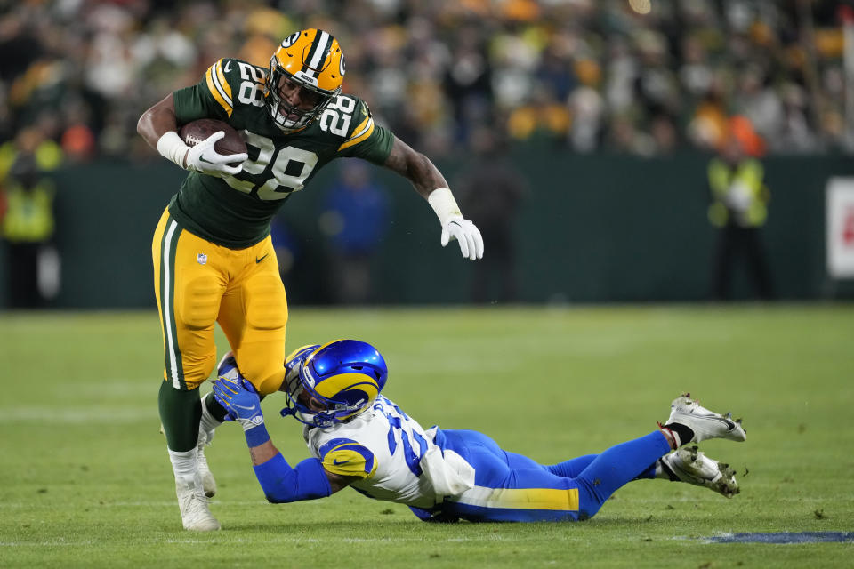 AJ Dillon and the Green Bay Packers picked up a win over the Rams on Monday night. (Photo by Patrick McDermott/Getty Images)