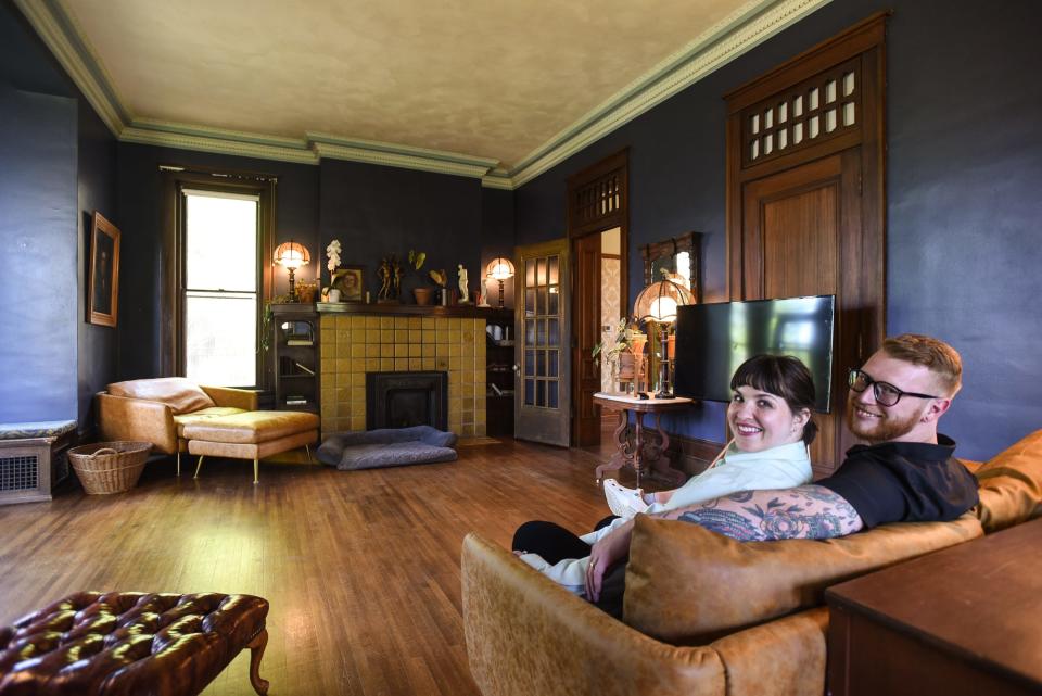 Trevor and Claire Breen, both 31, of St. Johns, pictured Tuesday, May 9, 2023, in the living room of their home in St. Johns, the historic Hicks Mansion, built in the 1870s.