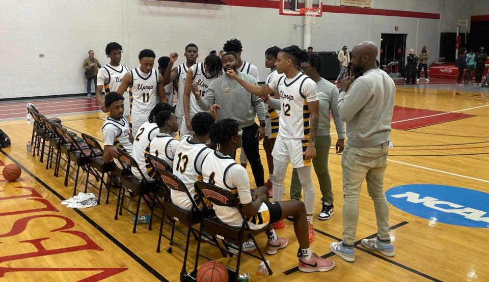 University Prep coach Jerice Crouch talks to his team during a 58-56 win over Rush-Henrietta in the Section V Class AAA quarterfinals Friday, Feb. 23, 2024 at Roberts Wesleyan University. Alex Webb scored the game-winning bucket with 1.5 seconds left.