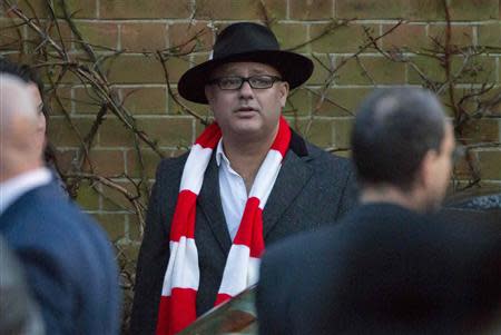 Michael Biggs leaves the funeral of his father Ronnie Biggs at Golders Green Crematorium in north London January 3, 2014. REUTERS/Neil Hall