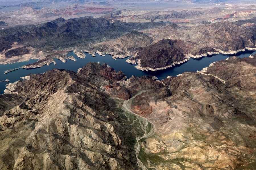 <em>FILE – In this aerial photo, a bathtub ring of light minerals shows the high water mark on the shore of Lake Mead along the border of Nevada and Arizona, Monday, March 6, 2023, near Boulder City, Nev. (AP Photo/John Locher, File)</em>