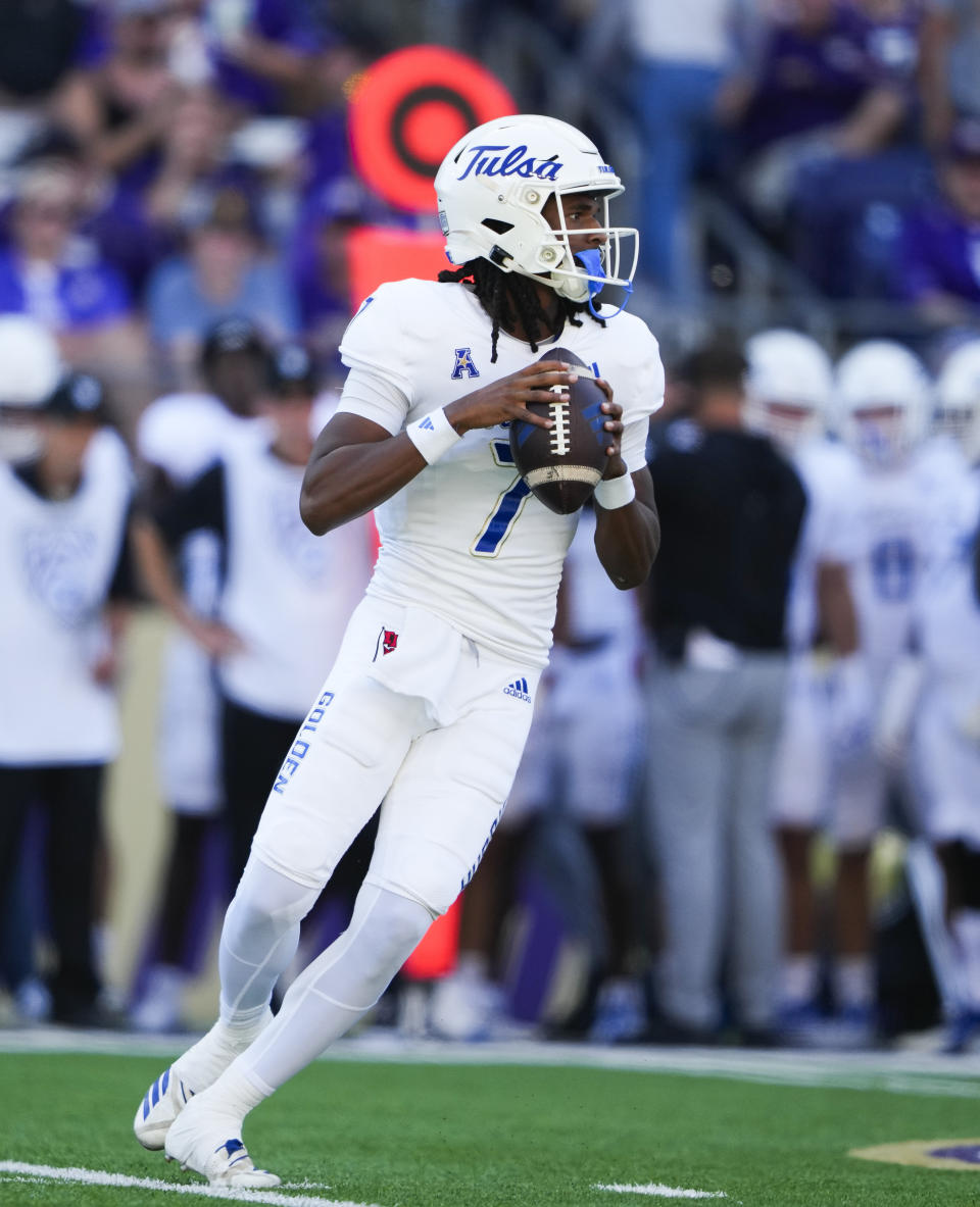 Tulsa quarterback Cardell Williams (7) looks to throw against Washington during the first half of an NCAA college football game Saturday, Sept. 9, 2023, in Seattle. (AP Photo/Lindsey Wasson)