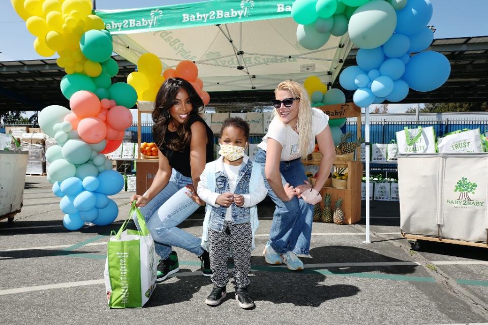 Kelly Rowland and Busy Philipps attend Baby2Baby’s B2B Safe Distribution event in Los Angeles on March 19, 2022. - Credit: Phillip Faraone/Getty Images