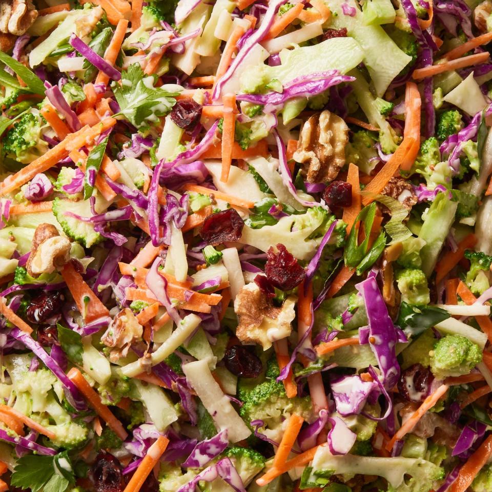 broccoli slaw with cabbage, carrots, scallions, toasted walnuts, dried cranberries, and maple dijon dressing