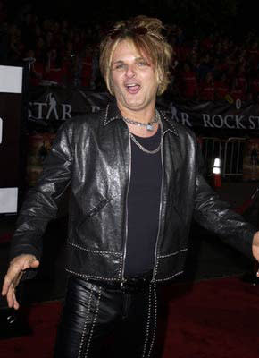 Rikki Rockett of Poison at the Westwood premiere of Warner Brothers' Rock Star