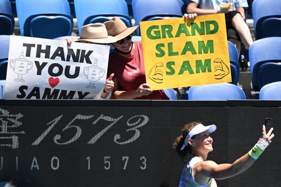 Stosur takes a selfie with fans after playing her last career singles match on Kia Arena.