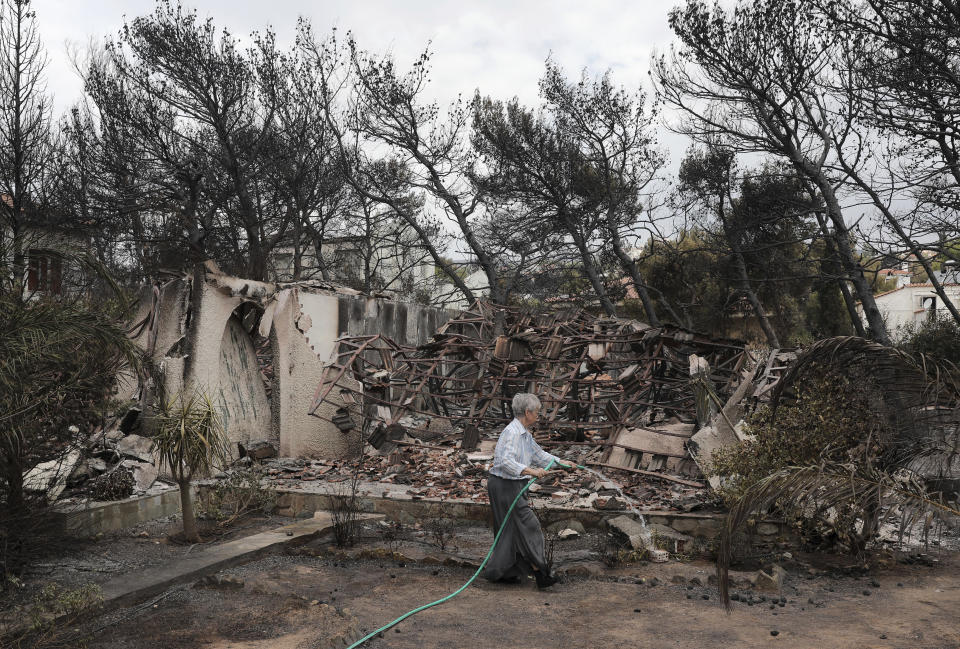 <em>Devastation – the fires have wreaked carnage across Greece, claiming the lives of 74 people so far (Picture: PA)</em>