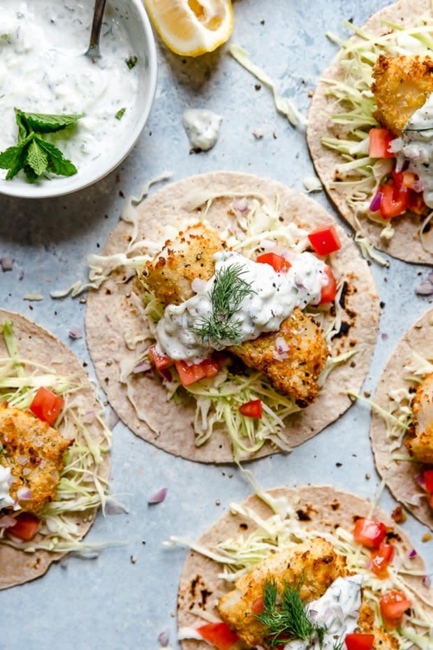 <p>Skinny Taste</p><p>Tzatziki fish tacos have a Greek twist! Made with breaded white fish filet topped with mint tzatziki sauce.</p><p><strong>Get the recipe: <a href="https://www.skinnytaste.com/tzatziki-fish-tacos/" rel="nofollow noopener" target="_blank" data-ylk="slk:Air Fryer Tzatziki Fish Tacos;elm:context_link;itc:0;sec:content-canvas" class="link ">Air Fryer Tzatziki Fish Tacos</a></strong></p>