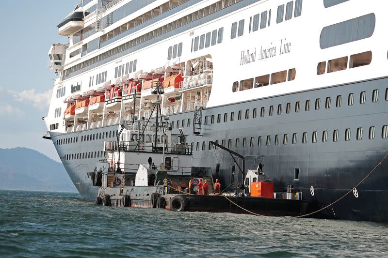 An offshore supply vessel is seen next to the cruise ship MS Rotherdam, which brought supplies and Covid-19 test kits to the MS Zaandam, where four passengers died, pictured off the coast of Panama City