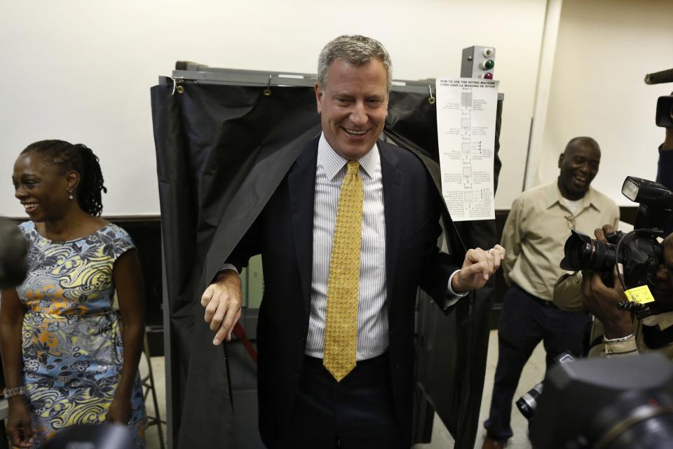 New York City democratic mayoral candidate Bill di Blasio exits a voting booth in the Brooklyn borough of New York after voting in the democratic primary election September 10, 2013. (REUTERS/Brendan McDermid)