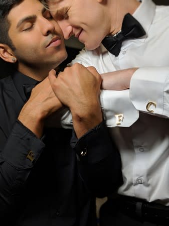 Blake Coelho and Matthew Fernando pose for a photo at the end of their wedding day