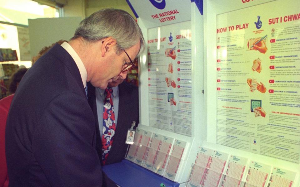 John Major was encouraged to be seen buying a lottery ticket - but aides feared embarrassment if he won - PA Archive