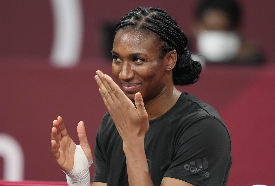 Foluke Akinradewo Gunderson, of the United States, prepares for a women's volleyball training session at the 2020 Summer Olympics, Thursday, July 22, 2021, in Tokyo, Japan. A third trip to the Olympics was far from a sure thing for Gunderson when she gave birth to her first son in November 2019. But Gunderson had set a goal of being both a mother and professional athlete and took advantage of the delayed Olympics to make it back again this year in search of that elusive gold medal. (AP Photo/Frank Augstein)