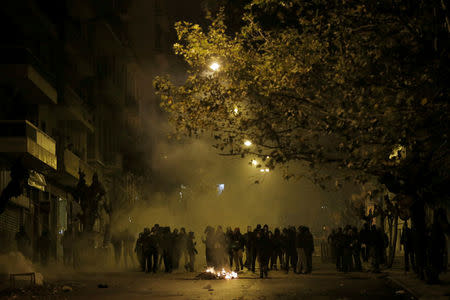 Protesters are seen during clashes following an anniversary rally marking the 2008 police shooting of 15-year-old student, Alexandros Grigoropoulos, in Athens, Greece, December 6, 2017. REUTERS/Alkis Konstantinidis