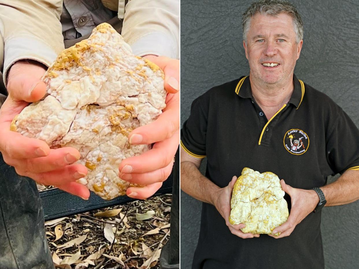 Darren Kamp holds a $160,000 rock.