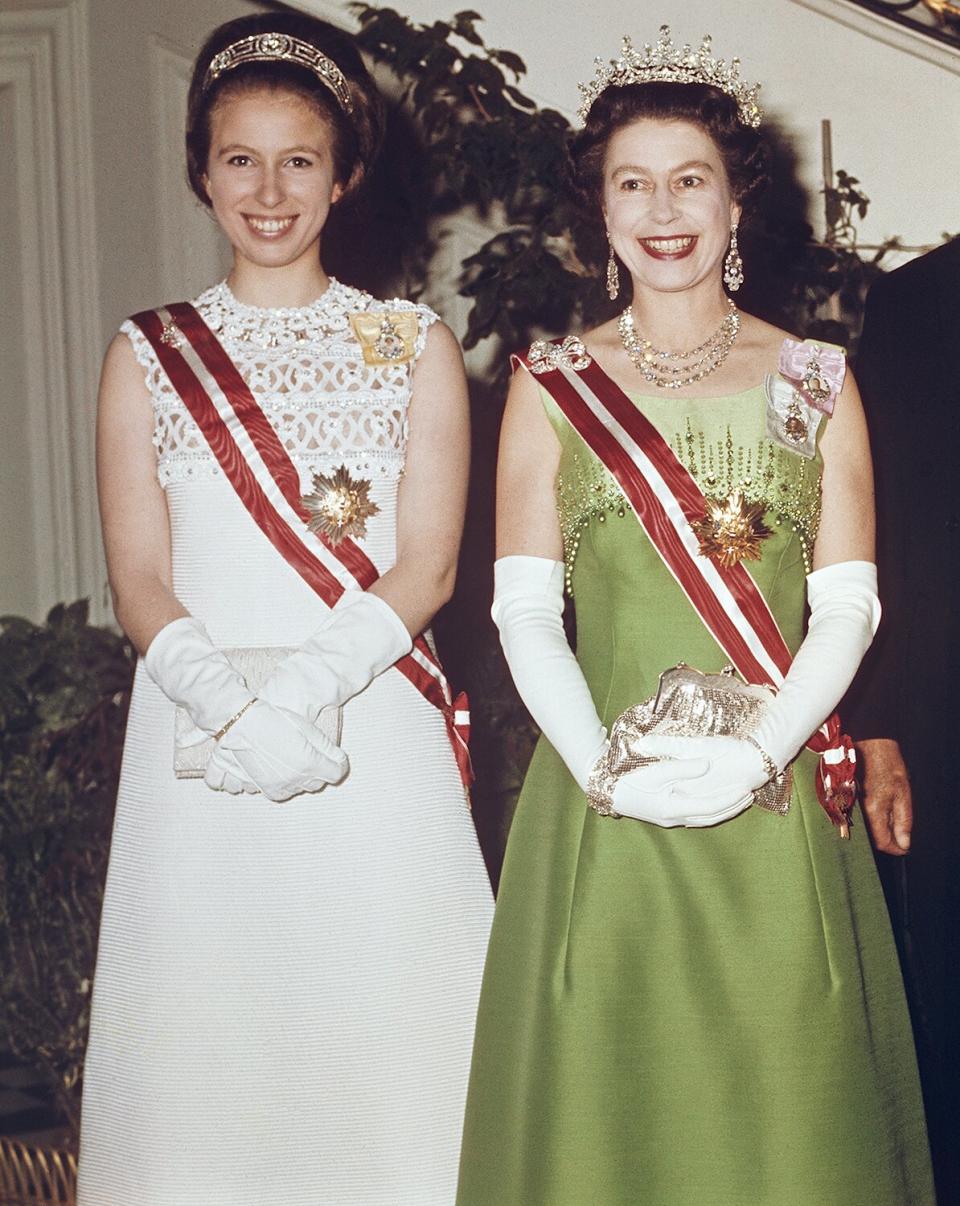 Queen Elizabeth II and Princess Anne attend a function at the Hotel Imperial in Vienna, during a State Visit to Austria, 7th May 1969.