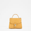 <p><i><a href="http://www.zara.com/uk/en/woman/bags/view-all/mini-embossed-city-bag-c819022p3230689.html" rel="nofollow noopener" target="_blank" data-ylk="slk:[Zara, £29.99];elm:context_link;itc:0;sec:content-canvas" class="link ">[Zara, £29.99]</a></i><br></p>