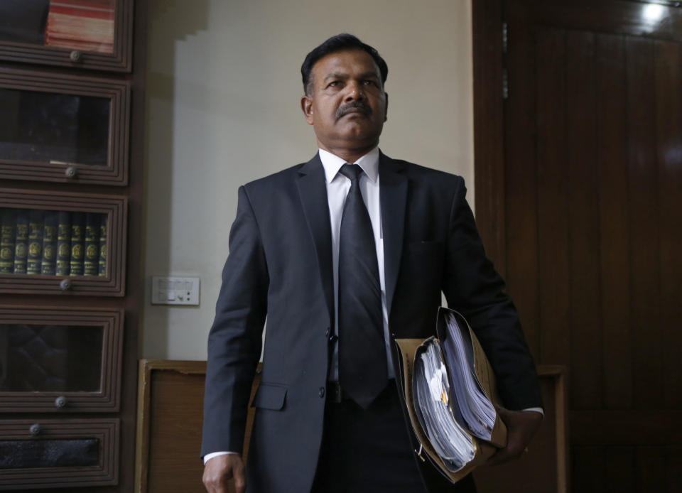 Naseeb Anjum, a lawyer for Nabeel Masih, a Christian man convicted while still a teenager in 2018 of blasphemy, arrives for an interview with The Associated Press, in Lahore, Pakistan, Monday, March 1, 2021. Anjum said a Pakistani court granted bail to Masih convicted of insulting Islam by posting a picture of Islam’s holiest site on social media. (AP Photo/K.M. Chaudary)