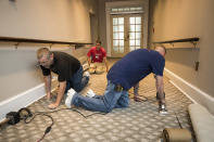 <p>Workmen install new carpet in the West Wing of the White House in Washington,, Friday, Aug. 11, 2017, as it undergoes renovations while President Donald Trump is spending time at his golf resort in New Jersey. (AP Photo/J. Scott Applewhite) </p>