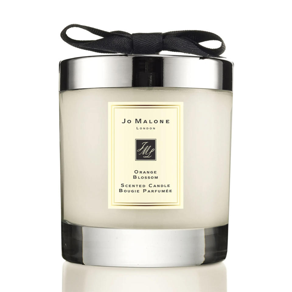 <p>The Duke and Duchess of Cambridge filled the air with Jo Malone's Orange Blossom candle for their 2011 wedding. It's the perfect scent to help royal lovers spring into summer.</p> <p><strong>Buy It! Jo Malone Orange Blossom Scented Home Candle, <a href="https://click.linksynergy.com/deeplink?id=93xLBvPhAeE&mid=1237&murl=https%3A%2F%2Fwww.nordstrom.com%2Fs%2Fjo-malone-london-orange-blossom-scented-home-candle%2F3010775&u1=PEO11RoyalsInspiredGiftsYouNeedThisSummerpetitsRoyGal12744024202106I" rel="sponsored noopener" target="_blank" data-ylk="slk:$69;elm:context_link;itc:0;sec:content-canvas" class="link ">$69</a></strong></p>