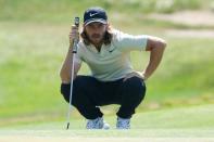 Jun 17, 2018; Southampton, NY, USA; Tommy Fleetwood lines up a putt on the fourteenth green during the final round of the U.S. Open golf tournament at Shinnecock Hills GC - Shinnecock Hills Golf C. Brad Penner-USA TODAY Sports