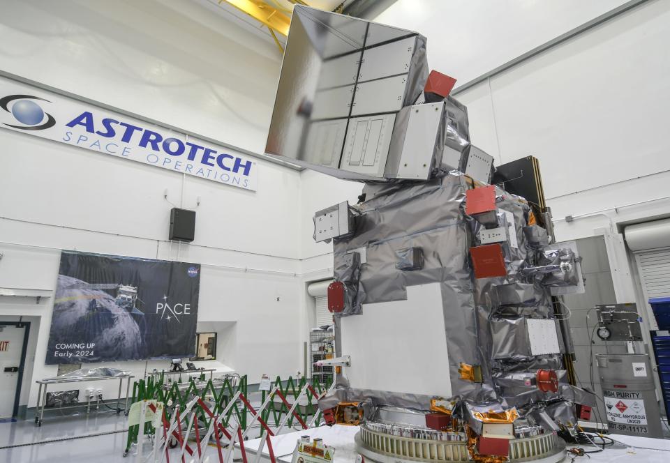 Members of the media get a closer look at NASA’s PACE (Plankton, Aerosol, Cloud ocean Ecosystem) satellite at Astrotech in Titusville, FL January 3, 2024. The satellite is scheduled to launch no earlier than Feb. 6 aboard a Falcon 9 rocket. Craig Bailey/FLORIDA TODAY via USA TODAY NETWORK