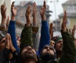 <p>Kashmiri Muslims pray as unseen priest shows a relic believed to be a hair from the beard of the Prophet Muhammad at the Hazratbal Shrine in Srinagar on January 1, 2016, on the last Friday of Eid-e-Milad-un-Nabi, the birthday of Prophet Muhammad. Thousands of Kashmiri Muslims gathered at the shrine in the summer capital of Jammu and Kashmir to offer prayers on the Prophet’s birth anniversary. </p>