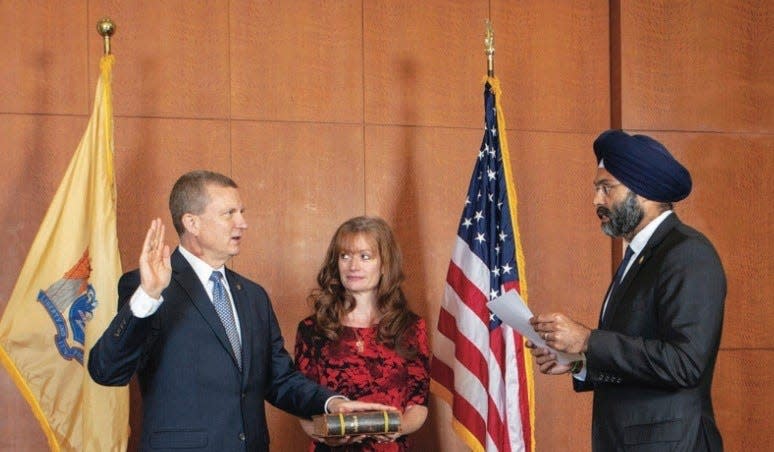 Submitted photo — 
Sussex County Prosecutor Francis Koch, left, is sworn in as president of the County Prosecutors’ Association of New Jersey by Attorney General Gurbir S. Grewal, right. At center is Koch’s wife, Mary Frances Koch.