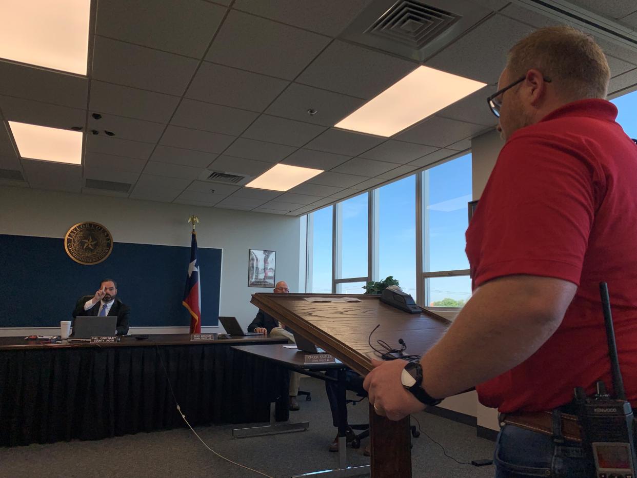 Taylor County Judge Phil Crowley reminds a member of the public that they have one minute remaining during the open comment period at the Taylor County Commissioners' meeting held April 23.