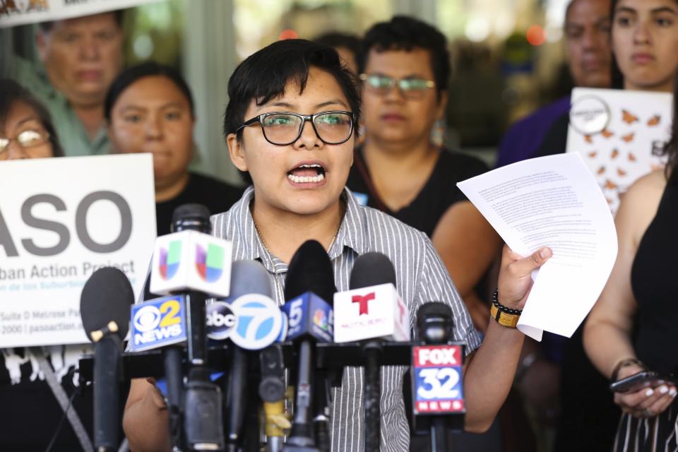 Rey Wences, an organizer at Organized Communities Against Deportations (OCAD), addresses reporters during a new conference outside U.S. Citizenship and Immigration Services offices in Chicago, Thursday, July 11, 2019. A nationwide immigration enforcement operation targeting people who are in the United States illegally is expected to begin this weekend. (AP Photo/Amr Alfiky)