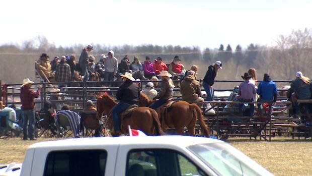 Hundreds attended a rodeo near Bowden, Alta., over the weekend in defiance of public health restrictions, despite surging COVID-19 cases. (Justin Pennell/CBC - image credit)