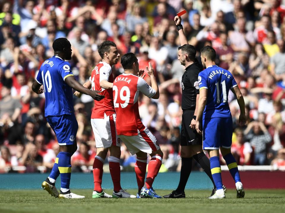 <p>Britain Football Soccer – Arsenal v Everton – Premier League – Emirates Stadium – 21/5/17 Arsenal’s Laurent Koscielny is shown a red card by referee Michael Oliver Reuters / Dylan Martinez Livepic </p>