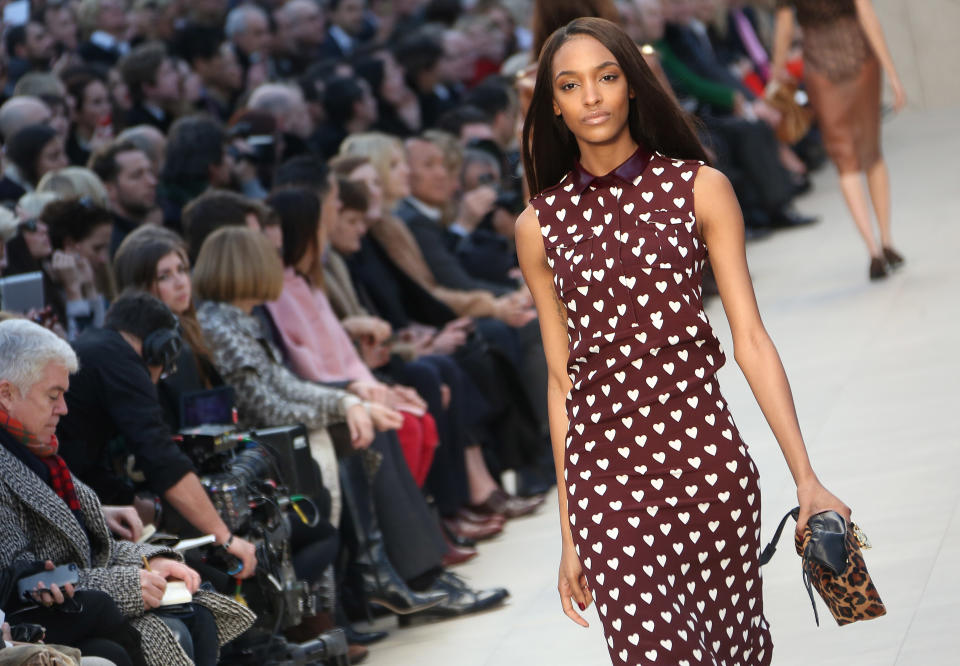 British model Jourdan Dunn wears a design created by Burberry Prorsum during London Fashion Week, at Kensington Gardens in west London, Monday, Feb. 18, 2013. (Photo by Joel Ryan/Invision/AP)