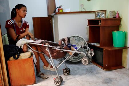 Geraldine Rocca, 29, waits for the results of a pregnancy test before her sterilization surgery in Caracas, Venezuela July 26, 2016. REUTERS/Carlos Garcia Rawlins