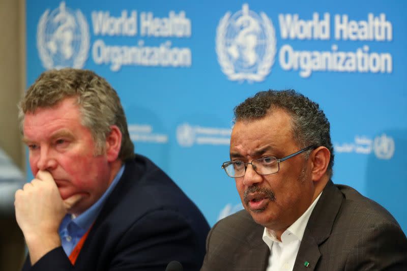 Director-General of the World Health Organization (WHO) Tedros Adhanom Ghebreyesus speaks next to Michael J. Ryan, Executive Director of the World Health Organization (WHO) Health Emergencies Programme during a news conference in Geneva