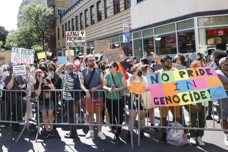 Protesters gather outside at the Stonewall National Monument Visitor Center grand opening ceremony in New York City. Photo by John Angelillo/UPI