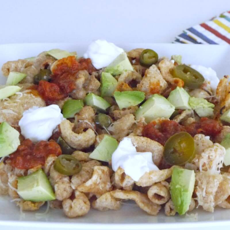 <p>Step Away From The Carbs</p><p>Switch out high-carb tortilla chips for this pork rind variation—crunchy and delicious! </p><p><strong>Get the recipe: <a href="https://stepawayfromthecarbs.com/pork-rind-nachos/" rel="nofollow noopener" target="_blank" data-ylk="slk:Low-Carb Pork Rind Nachos;elm:context_link;itc:0;sec:content-canvas" class="link ">Low-Carb Pork Rind Nachos</a></strong></p>