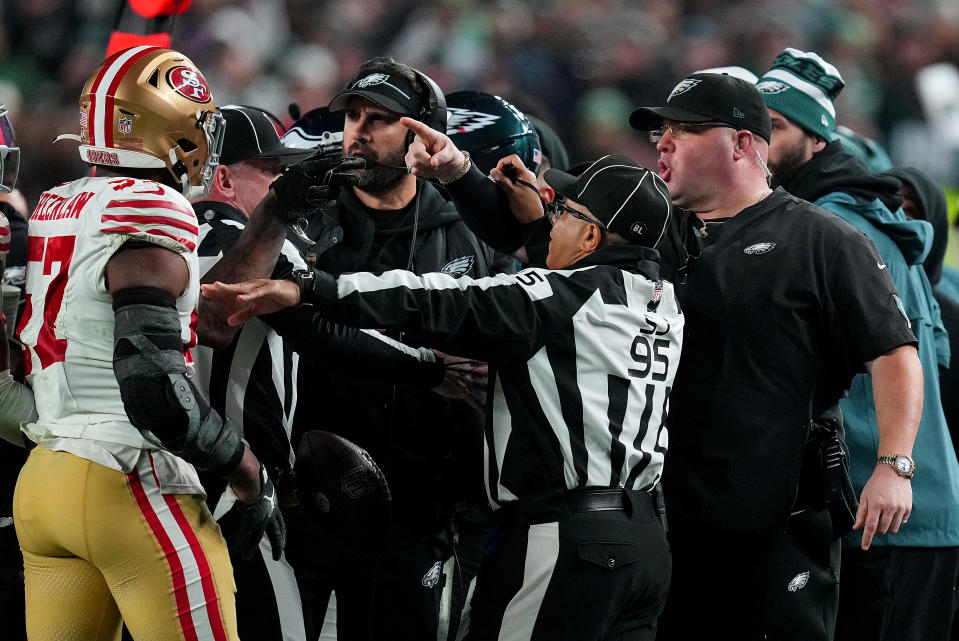 PHILADELPHIA, PENNSYLVANIA - DECEMBER 03: Dre Greenlaw #57 of the San Francisco 49ers exchanges words with Philadelphia Eagles head coach Nick Sirianni and Dom DiSandro at Lincoln Financial Field on December 03, 2023 in Philadelphia, Pennsylvania. Dre Greenlaw #57 of the San Francisco 49ers and Dom DiSandro of the Eagles were disqualified after the altercation. (Photo by Mitchell Leff/Getty Images)