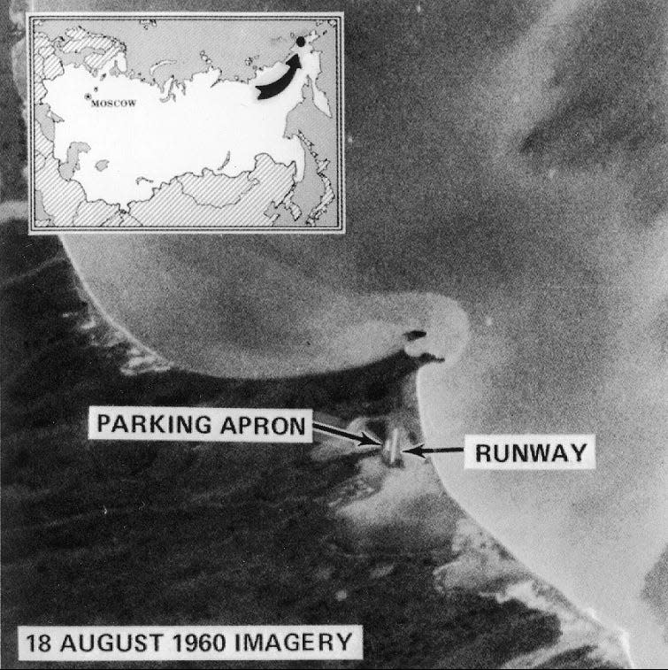 An image of a runway in Russia taken on the first Corona mission in 1960 with arrows depicting the parking apron and runway.