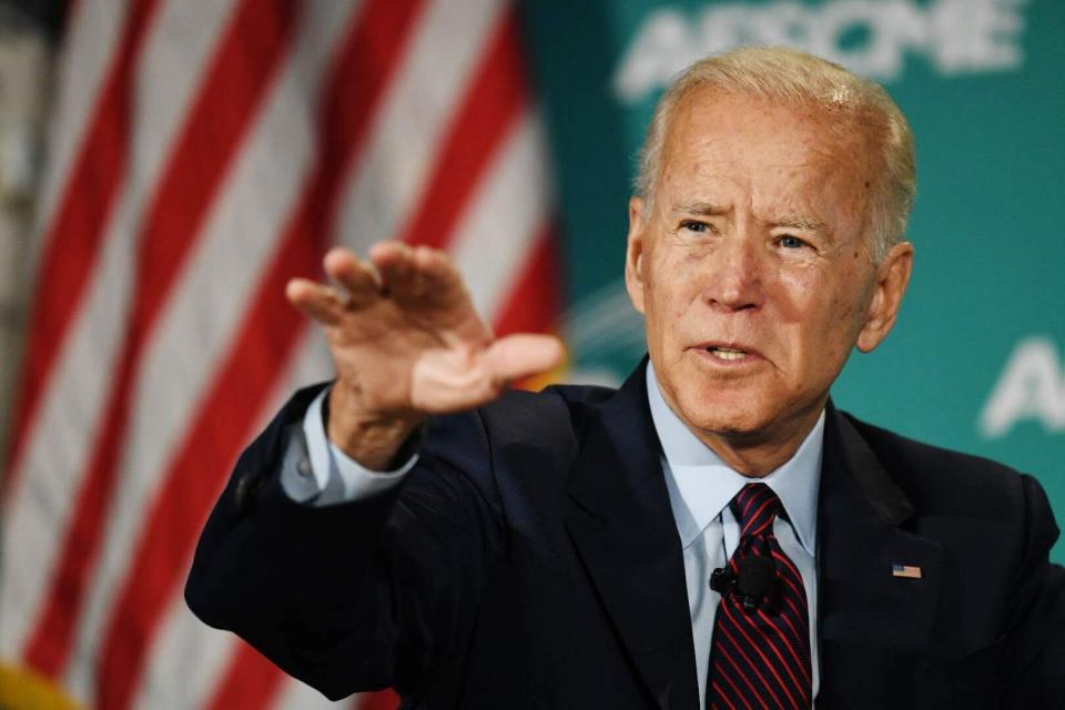 Joe Biden speaks at the AFSCME forum in Las Vegas on Saturday. "This has been an all-out war on suppressing wages to increase profits," he says. (Photo: Damon Dahlen/HuffPost)