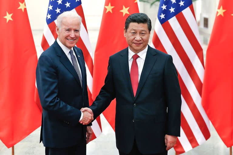 Joe Biden junto a Xi Jinping