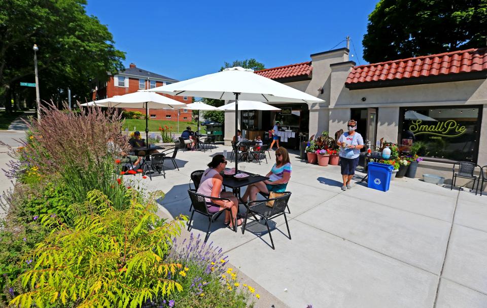 Diners stay well spaced out July 1 at  Small Pie, 2504 E. Oklahoma Ave., in Milwaukee's Bay View area.