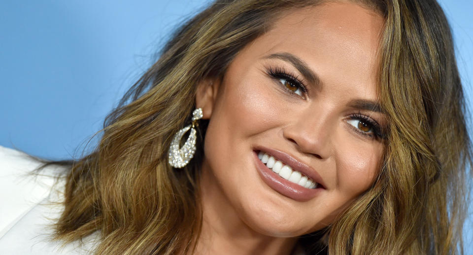 Chrissy Teigen reveals how one mom-shaming comment actually proved useful.  (Photo by Axelle/Bauer-Griffin/FilmMagic)