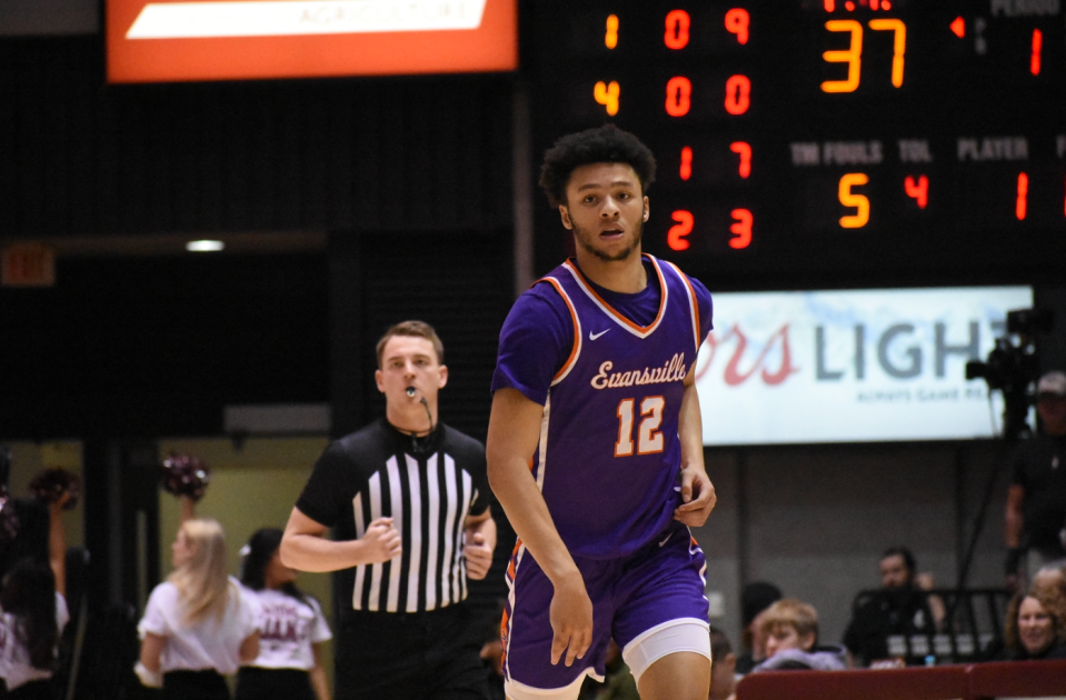 Evansville men's basketball guard Chris Moncrief dribbles against Southern Illinois.