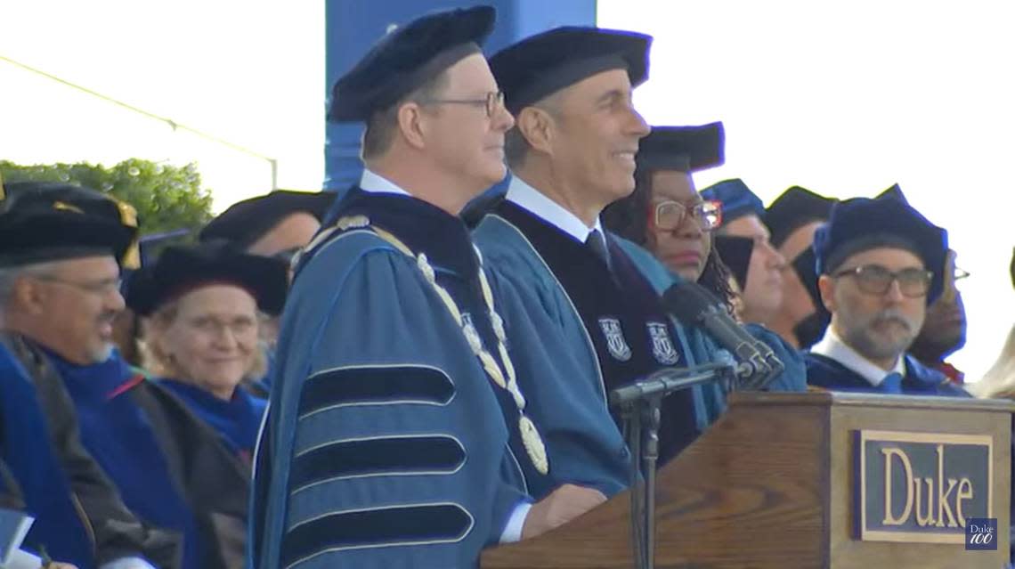 Comedian Jerry Seinfeld and Duke University President look on Sunday as protesters walk out of the school’s commencement address. Calling for the school to divest from companies supporting Israel’s war against Palestine, the protesters left as Seinfeld, who has been vocal about his support for Israel, was being introduced.
