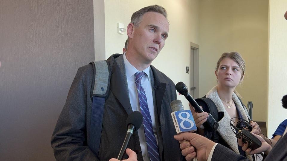 Matthew Borgula, the attorney representing Christopher Schurr, speaks to reporters following a preliminary hearing Friday, Oct. 28, 2022, at the Kent County Courthouse in Grand Rapids, Mich. Schurr, a former Grand Rapids Police officer, is charged with second-degree murder for the April shooting of Patrick Lyoya.