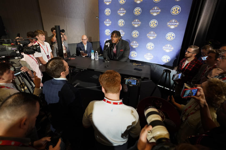 Alabama offensive lineman JC Latham responds to questions during NCAA college football Southeastern Conference Media Days, Wednesday, July 19, 2023, in Nashville, Tenn. (AP Photo/George Walker IV)