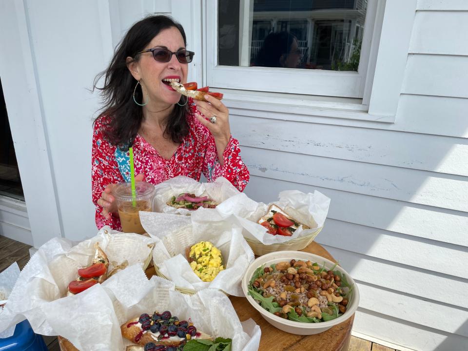 Enjoying heirloom tomato toast at Katonah Reading Room in Katonah on June 21, 2023.