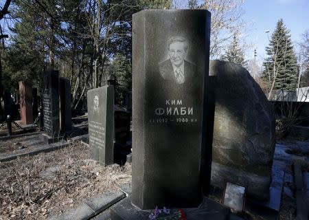 A view shows the grave (R, front) of British double agent Kim Philby at a cemetery in Moscow, Russia, April 4, 2016. REUTERS/Sergei Karpukhin