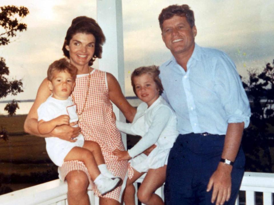 <p>Boston Herald/Shutterstock</p> John F. Kennedy Jr., Jackie Kennedy, Caroline Kennedy and John F. Kennedy